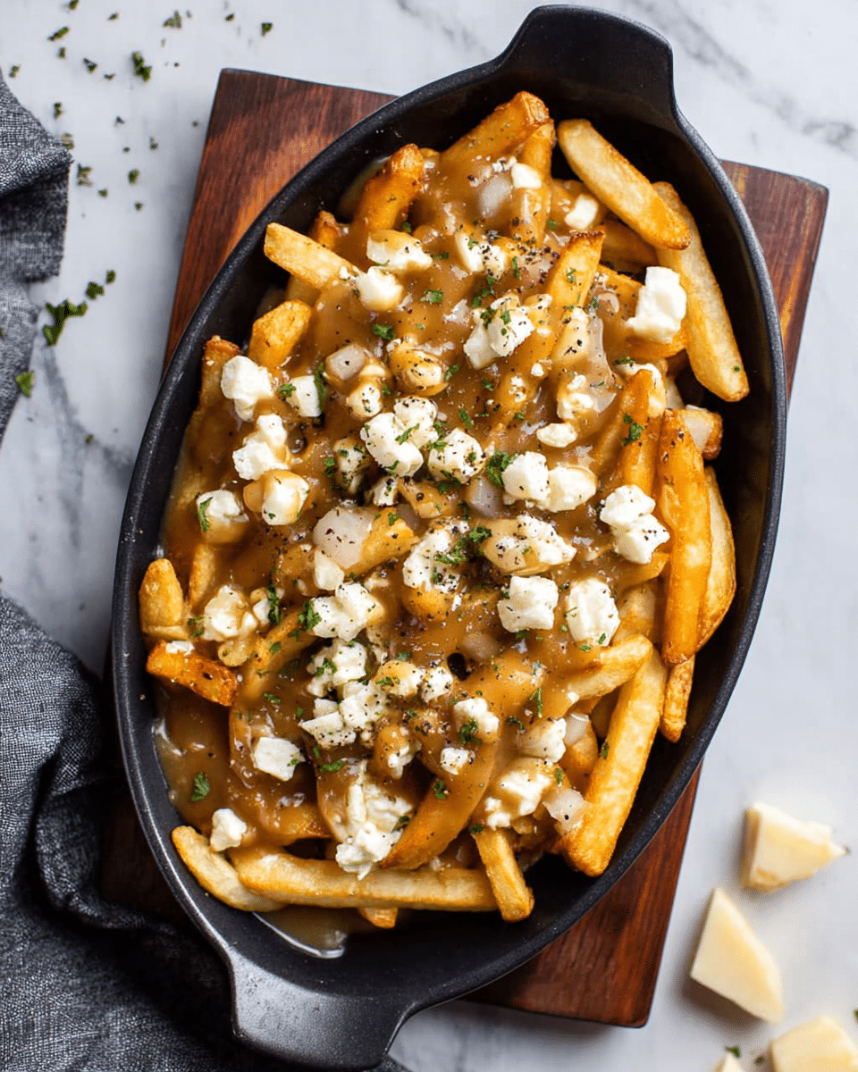 A black round bowl filled with a thick layer of golden fries that are crispy and slightly textured, with smooth, light brown gravy being poured gently over the top from above, covering the fries in a glossy, creamy sauce that cascades down in ribbons. The bowl sits on a dark wooden board on a white marbled surface, with small pieces of white cheese scattered near the front edge of the board. Part of a gray and white cloth is visible at the left bottom corner. photo taken with an iphone --ar 4:5 --v 7