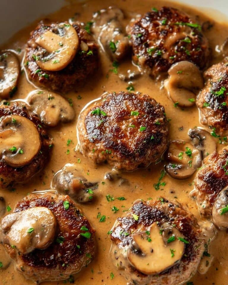 Smothered Rissoles with Mushroom Gravy over Mashed Potatoes Recipe